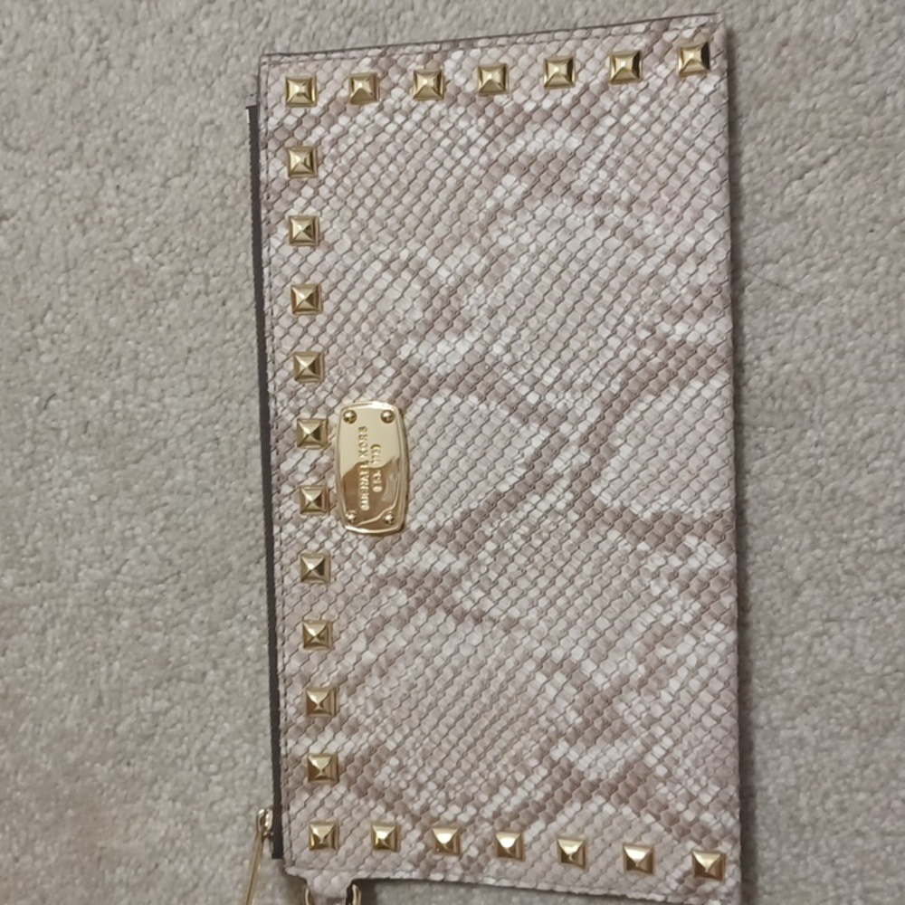 MK snakeskin clutch